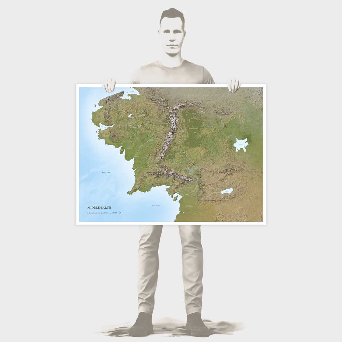 Illustration of Rinus holding the Middle-earth Map Regular Edition poster