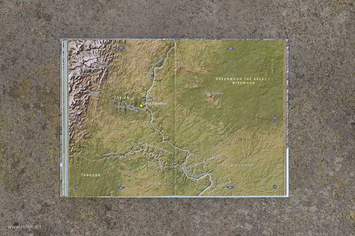 Open spread of The Maps of Middle-earth showing Caras Galadhon on the Middle-earth map