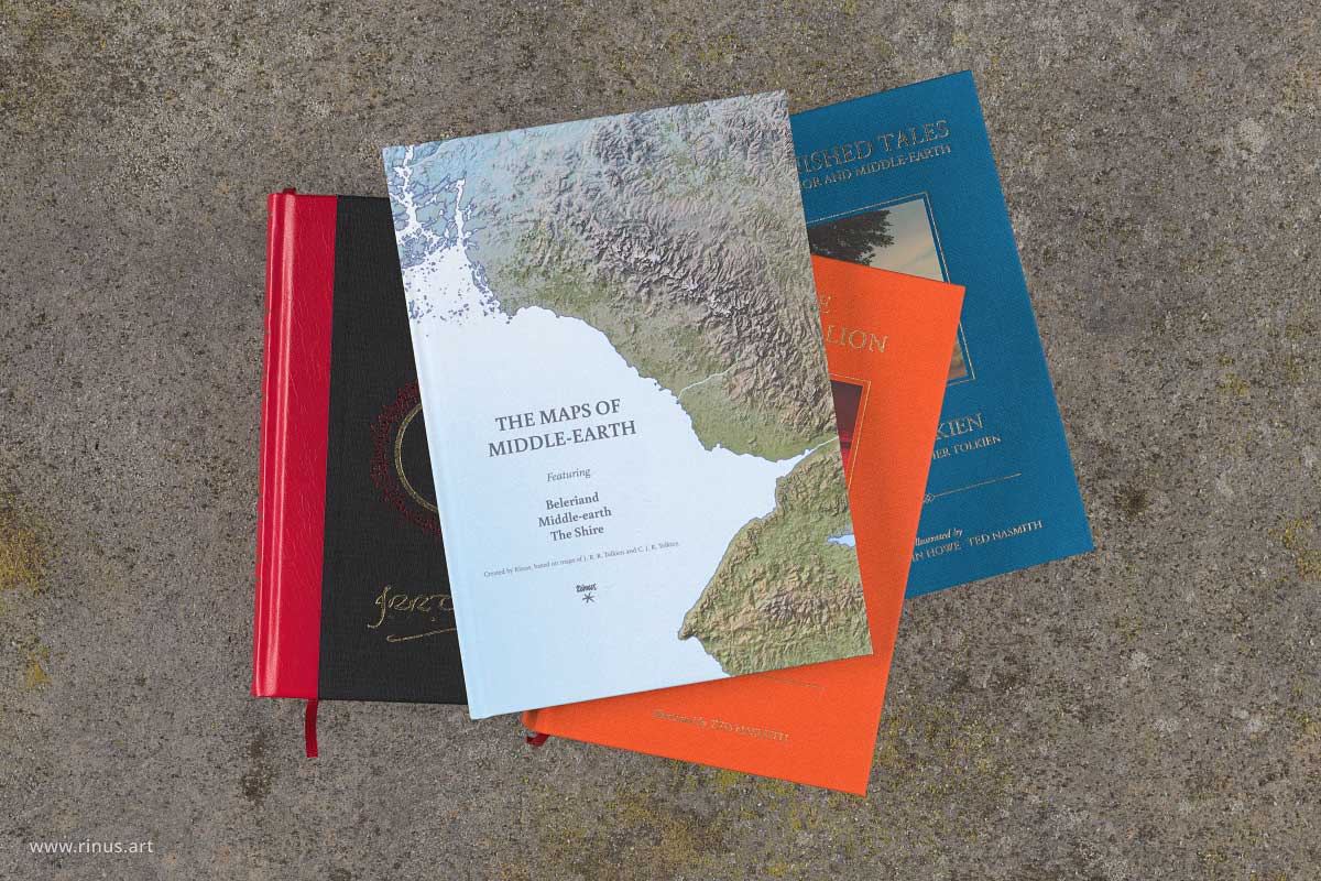 The Maps of Middle-earth hardcover book shown with deluxe Tolkien editions for scale